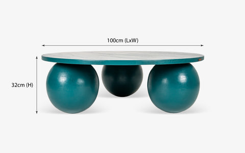 Ala Coffee Table in green stained mango wood, a modern round center table design ideal for living room decor and stylish coffee table designs.