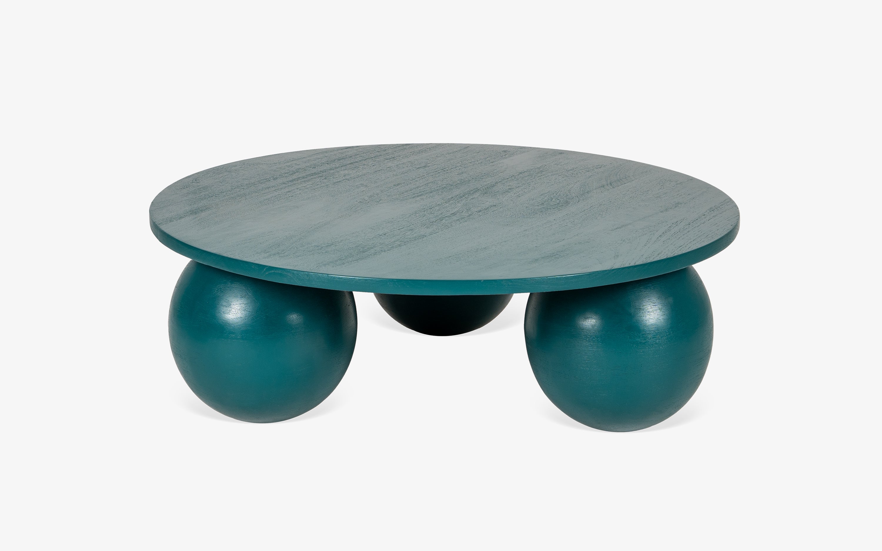 Ala Coffee Table in green stained mango wood, a modern round center table design ideal for living room decor and stylish coffee table designs.