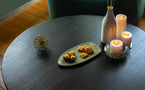 Modern Ala Noir Coffee Table with Black Mango Wood and Spherical Bases.