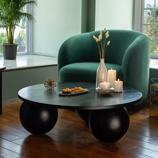 Modern Ala Noir Coffee Table with Black Mango Wood and Spherical Bases.