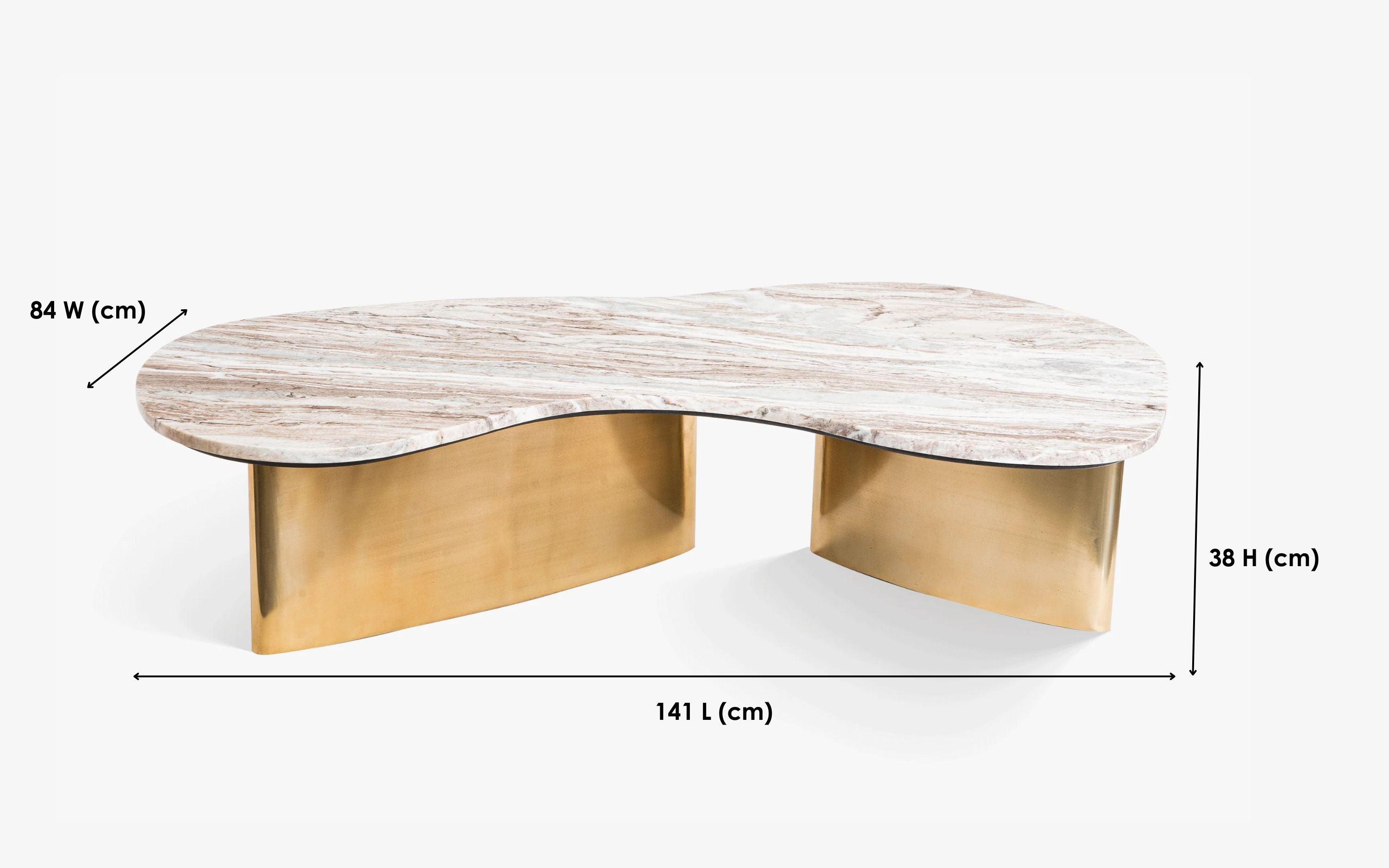 Berg Coffee Table with marble top and brushed brass legs. A luxury and modern coffee table perfect for living room decor.