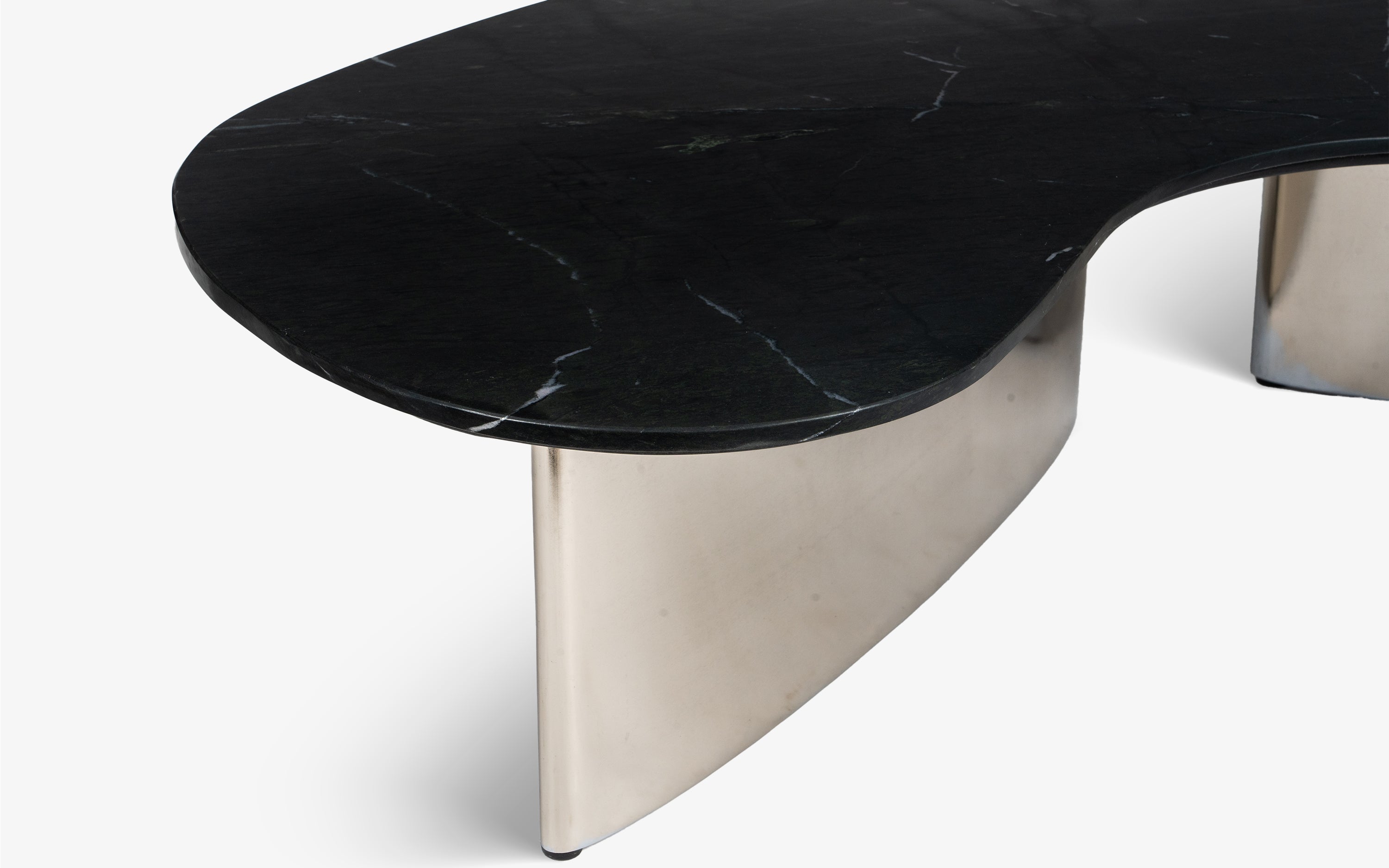 Berg Eclipse marble top coffee table with marine marble top and chrome finish mild steel base, perfect as center table for living room.