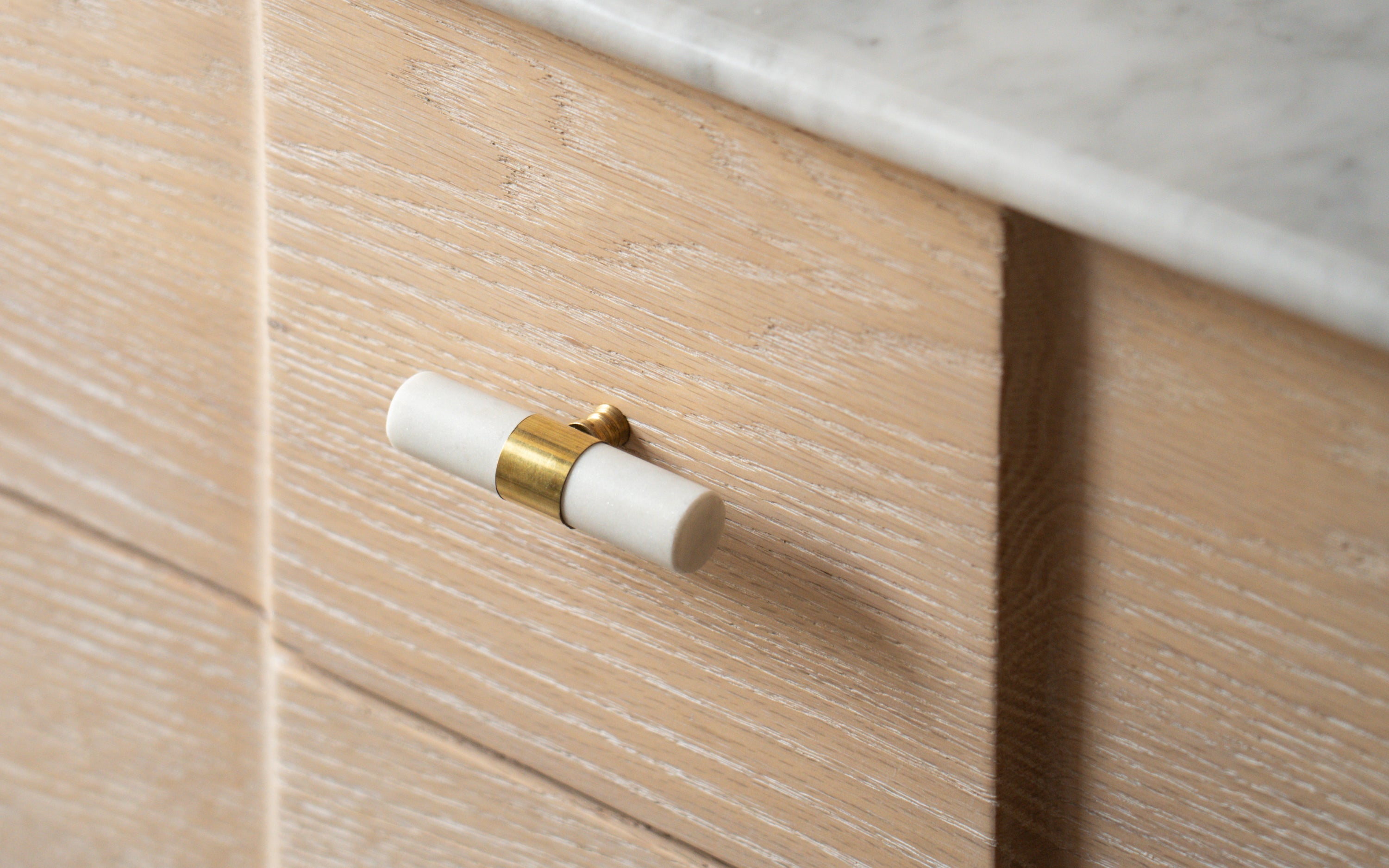 Dune Chest of Drawers in Solid Wood with White Ash Finish - Close shot - from left angle - Orange Tree