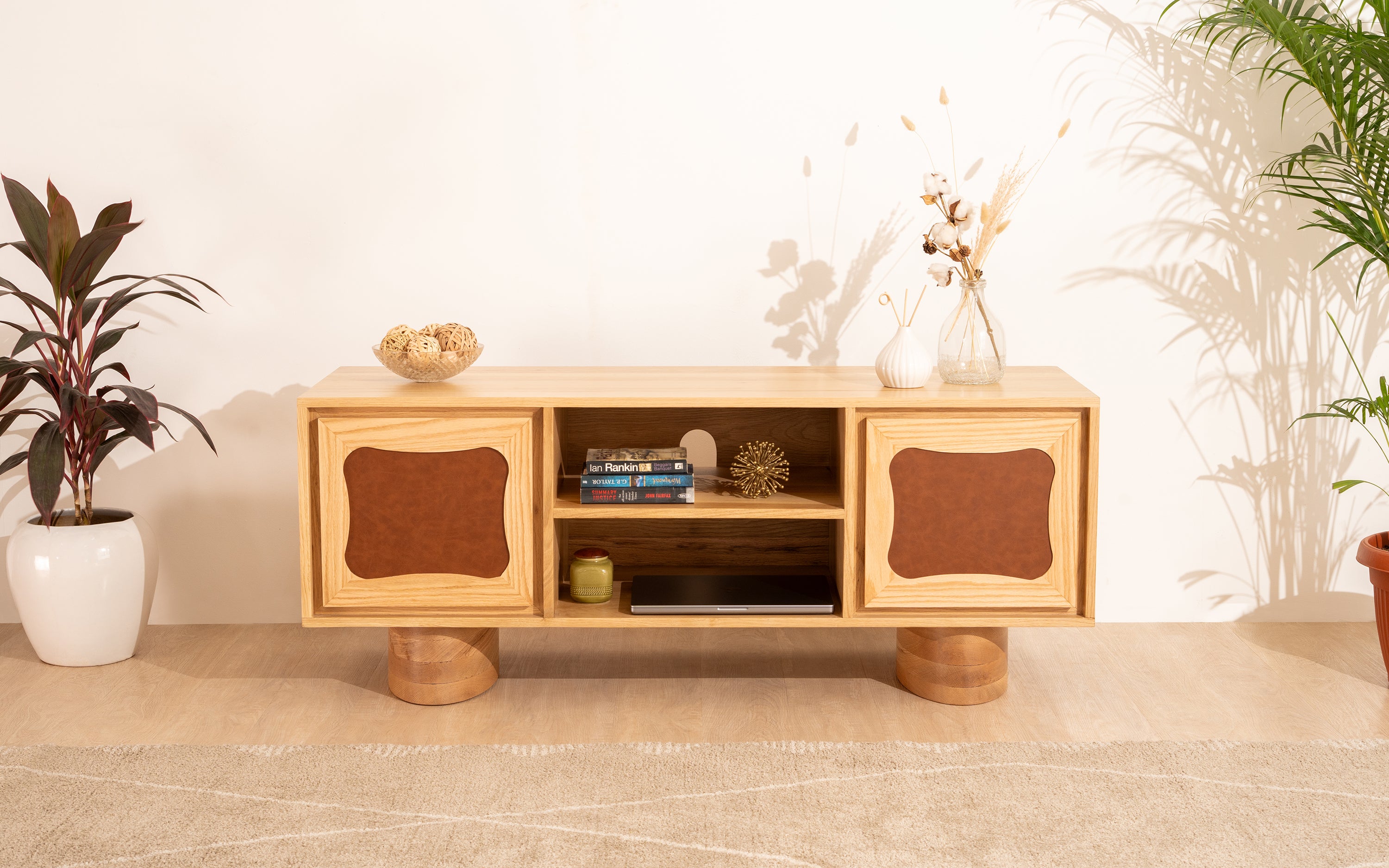 Luna Storage TV Unit, a modern tv cabinet with oak wood and leatherette accents, is perfect for the main hall modern tv unit design and living room tv unit with storage.