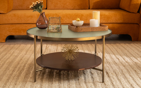 Mira Coffee Table with glass top, walnut-finished wood, and brass legs, ideal as a modern center table or tea table for living room decor.