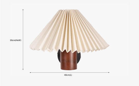 White pleated shade wall lamp with a natural wooden cylindrical base in walnut finish, perfect as a bedside wall lamp or decorative wall sconce for minimalist and vintage interiors.